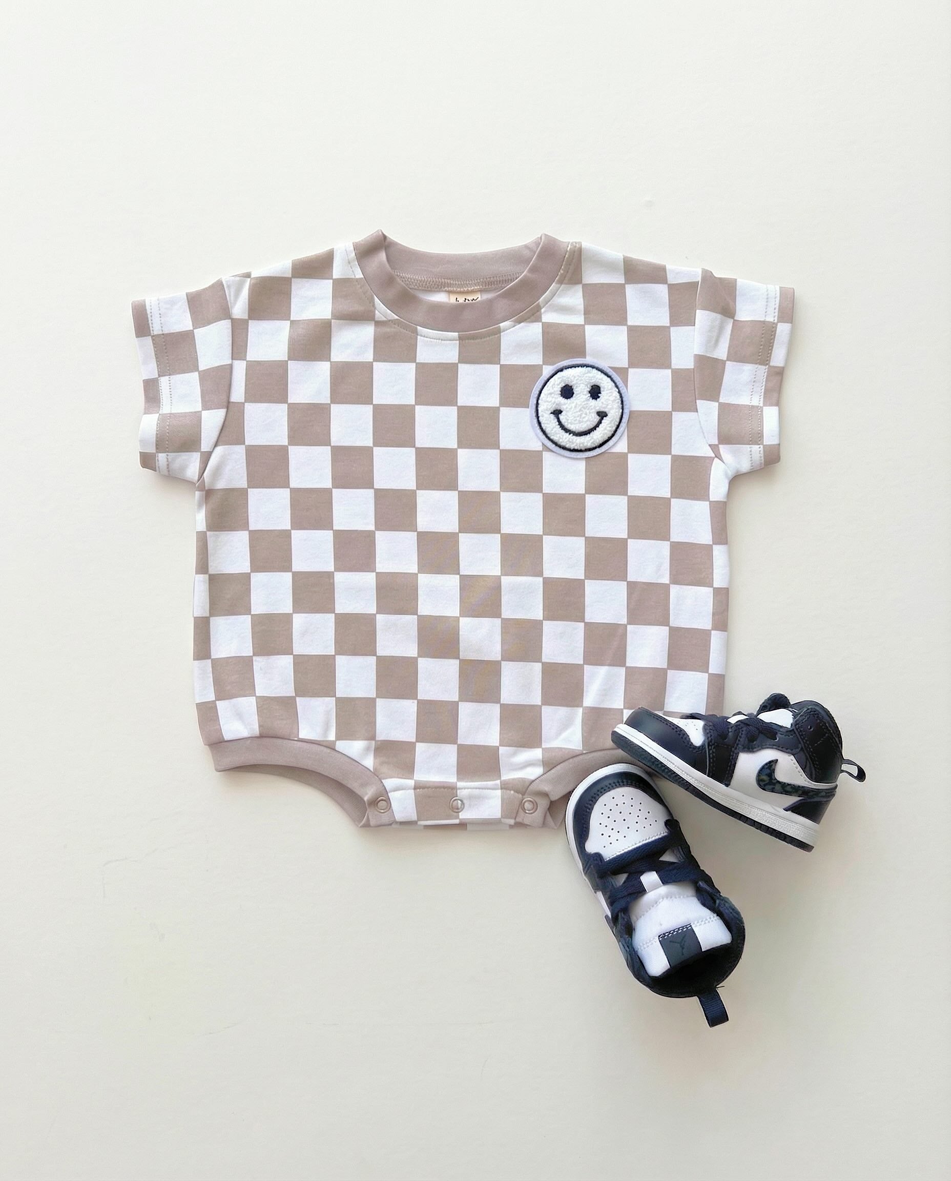 Short Sleeve Bubble Romper | Checkered Smiley Latte